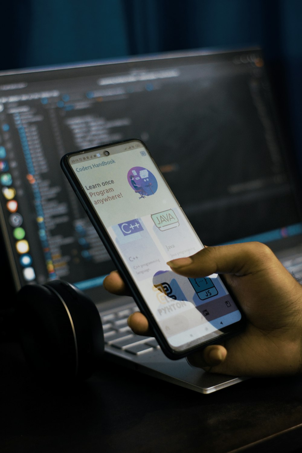 Mobile app and code showing automation concept